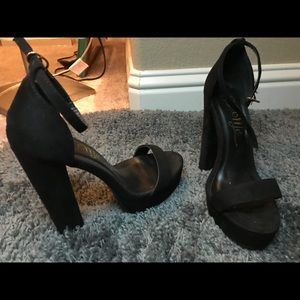 Tall black heels